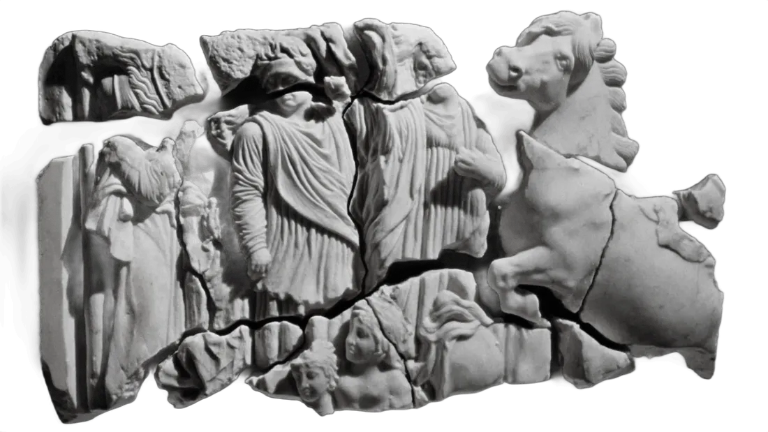 Fragments of a marble frieze: robed figures and a rearing horse